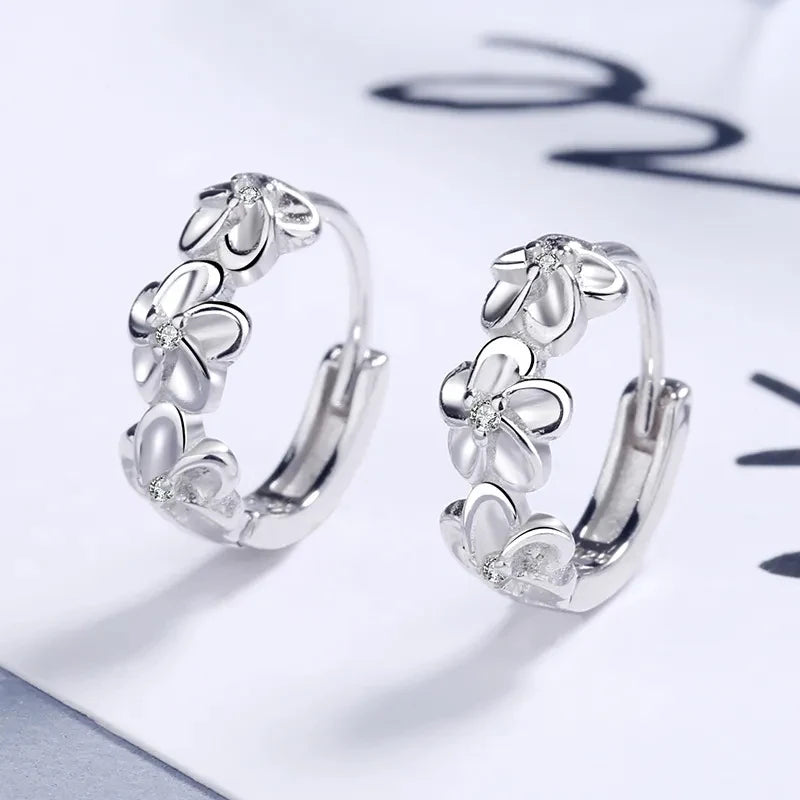 Sparkling Crystal Floral Silver Stud Earrings – Elegant & Timeless