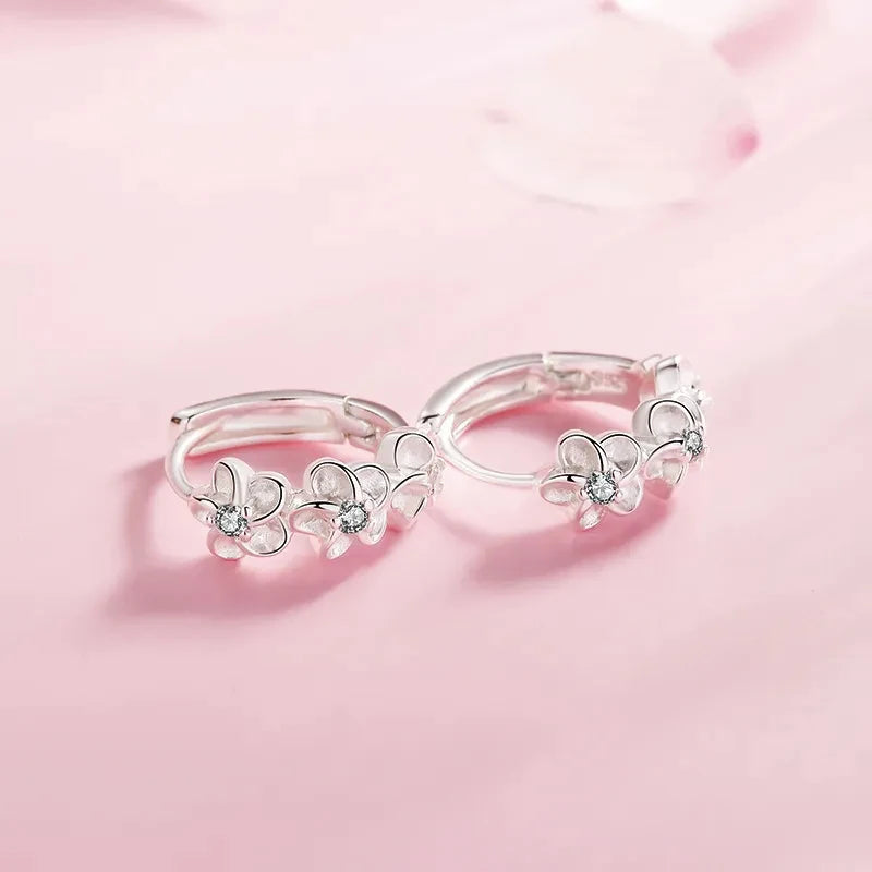 Sparkling Crystal Floral Silver Stud Earrings – Elegant & Timeless