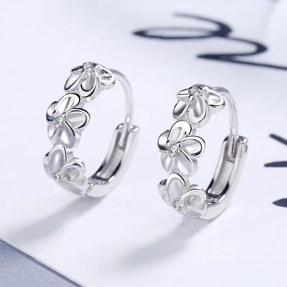 Sparkling Crystal Floral Silver Stud Earrings – Elegant & Timeless